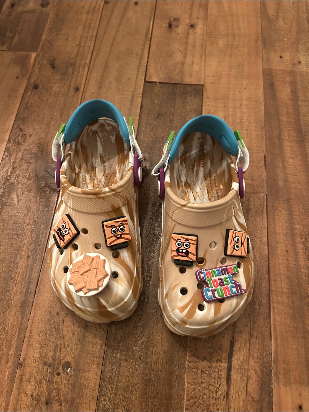 CROCS Kids Tan Swirl Clog with Blue Strap and Colorful Charms